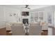 Cozy living room showcasing a fireplace, large windows, and neutral furnishings at 346 Ardmore Ct, Atlanta, GA 30309