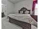 Cozy bedroom with soft carpet, natural light, and access to an ensuite bathroom, providing a peaceful retreat at 1510 Silver Mist Cir, Powder Springs, GA 30127