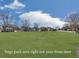 View of the community park situated next to well-maintained homes under a partly cloudy blue sky at 1510 Silver Mist Cir, Powder Springs, GA 30127