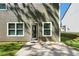 This home has a backyard with a door and windows, offering a seamless transition from indoor to outdoor living at 224 Eva Way, Cartersville, GA 30121