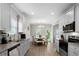 Open kitchen view leading into the dining area with lots of natural light at 224 Eva Way, Cartersville, GA 30121