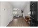 Bright, open living room with a fireplace, ceiling fan, and hardwood floors at 224 Eva Way, Cartersville, GA 30121