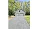The property includes a two-car detached garage with an asphalt driveway at 534 534 Shannon Way, Lawrenceville, GA 30044