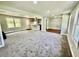 Open-concept living room with connecting kitchen and dining areas at 534 534 Shannon Way, Lawrenceville, GA 30044