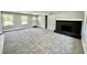 Spacious living room featuring a decorative fireplace and natural light at 534 534 Shannon Way, Lawrenceville, GA 30044