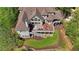 Aerial view showcasing the private backyard and outdoor deck at 560 Brook Manor Dr, Johns Creek, GA 30022