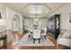 Open dining room with traditional decor and elegant lighting, perfect for hosting gatherings and formal dinners at 560 Brook Manor Dr, Johns Creek, GA 30022