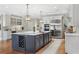 Modern kitchen with a large island, stainless steel appliances, and plenty of counter space, ideal for cooking at 560 Brook Manor Dr, Johns Creek, GA 30022