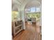 Beautiful home showcasing an open living room with hardwood floors and lots of natural light at 560 Brook Manor Dr, Johns Creek, GA 30022