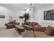 Relaxing living room featuring comfortable couches, accent lighting, and calming decor at 560 Brook Manor Dr, Johns Creek, GA 30022