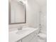 This bathroom has a shower and a white vanity with sink at 7162 Linden Dr, South Fulton, GA 30349