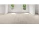 Spacious bedroom with neutral carpet, two large windows, and closet with great sunlight at 7162 Linden Dr, South Fulton, GA 30349