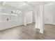 Well-lit dining space with coffered ceilings, wainscoting, and an open floor plan at 7162 Linden Dr, South Fulton, GA 30349