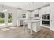Contemporary kitchen featuring white cabinetry, stainless appliances, and a center island at 7162 Linden Dr, South Fulton, GA 30349