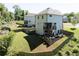 Private backyard with an outdoor patio and wooded backdrop is perfect for entertaining at 1984 Yellow Finch Se Trl, Atlanta, GA 30316