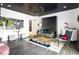 Unique bonus room with black ceiling, modern lighting, and stylish furniture at 1984 Yellow Finch Se Trl, Atlanta, GA 30316