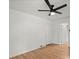 Spacious bedroom with hardwood floors and ceiling fan for comfortable living at 3915 Ivy Ne Rd, Atlanta, GA 30342