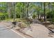 Long private driveway leads to the home with a brick mailbox at 3915 Ivy Ne Rd, Atlanta, GA 30342