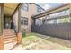 Brick home exterior featuring a covered walkway, fenced-in yard, and convenient access to multiple entrances at 683 Pryor Sw St # C, Atlanta, GA 30315