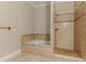 Bathroom features tiled floors, a separate tub and shower at 683 Pryor Sw St # C, Atlanta, GA 30315