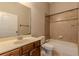 Neutral toned bathroom with tub shower combo and vanity at 683 Pryor Sw St # C, Atlanta, GA 30315