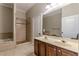 Bathroom features double sinks, tile flooring, separate shower, and a soaking tub at 683 Pryor Sw St # C, Atlanta, GA 30315