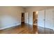 Spacious bedroom leads to a bathroom and closet with hardwood floors at 683 Pryor Sw St # C, Atlanta, GA 30315