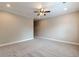 Spacious bedroom features neutral carpet, paint, and trim with a ceiling fan at 683 Pryor Sw St # C, Atlanta, GA 30315