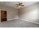 Spacious bedroom features neutral carpet, paint, and trim with a ceiling fan and ample space at 683 Pryor Sw St # C, Atlanta, GA 30315