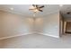 Spacious bedroom features neutral carpet, paint, and trim and a ceiling fan at 683 Pryor Sw St # C, Atlanta, GA 30315