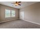 Bedroom featuring large window, carpeted floors and ceiling fan at 683 Pryor Sw St # C, Atlanta, GA 30315