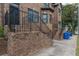 Brick townhome with stairs that lead to the wrought iron security door entrance at 683 Pryor Sw St # C, Atlanta, GA 30315