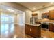 Open floor plan featuring kitchen island, stainless appliances, and open access to living room at 683 Pryor Sw St # C, Atlanta, GA 30315