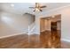 Living room featuring hardwood floors, open floor plan, and staircase at 683 Pryor Sw St # C, Atlanta, GA 30315