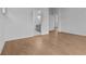 Bedroom featuring hardwood floors and a view into the ensuite bathroom at 231 Strawberry Ln, Woodstock, GA 30189