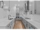 Kitchen features modern island with sink, built in microwave/oven, and stainless steel appliances at 231 Strawberry Ln, Woodstock, GA 30189