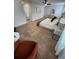 Spacious main bedroom boasts carpet, natural lighting, and space for seating and dresser at 4835 Station Lane -Lot 27, Union City, GA 30349