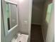 Bathroom featuring a sink and view into a closet at 624 Moselle Sw Dr, Mableton, GA 30126
