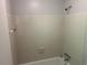 A clean shower stall with tiled walls and new fixtures at 624 Moselle Sw Dr, Mableton, GA 30126