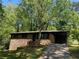 Brick home with a driveway and covered parking at 624 Moselle Sw Dr, Mableton, GA 30126