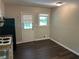 Open-concept dining area with hardwood floors next to kitchen at 624 Moselle Sw Dr, Mableton, GA 30126