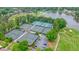 Aerial view of the tennis courts near a lake at 210 Malvern Pl, Roswell, GA 30076