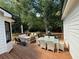 Spacious wooden deck with ample seating, dining area, and a lovely wooded backdrop at 4392 Lower Fayetteville Rd, Sharpsburg, GA 30277