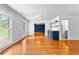Elegant dining room featuring hardwood floors and a blue accent bar perfect for gatherings at 4392 Lower Fayetteville Rd, Sharpsburg, GA 30277