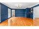 Open living room with gorgeous blue trim and molding at 4392 Lower Fayetteville Rd, Sharpsburg, GA 30277