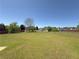 Wide backyard with a fence, offering ample space and privacy, enhanced by lush greenery and serene surroundings at 502 Owens Springs Ln, Mcdonough, GA 30252