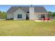 A fenced backyard with a patio area, offering privacy and space for outdoor enjoyment at 502 Owens Springs Ln, Mcdonough, GA 30252