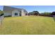 Spacious backyard with a patio set ideal for outdoor entertainment and relaxation at 502 Owens Springs Ln, Mcdonough, GA 30252