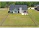 The backyard is fenced in, offering a secure space for relaxation and outdoor fun at 502 Owens Springs Ln, Mcdonough, GA 30252