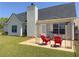 Backyard patio area with an open air gazebo, a table and chairs at 502 Owens Springs Ln, Mcdonough, GA 30252